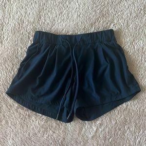Stroll At Sundown Mid-rise short 3” in navy blue